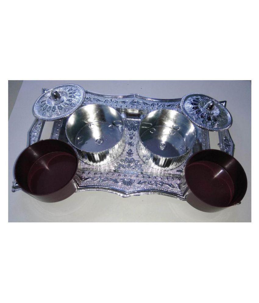 Stylish mukhwas tray with ornate design and two silver containers for serving snacks
