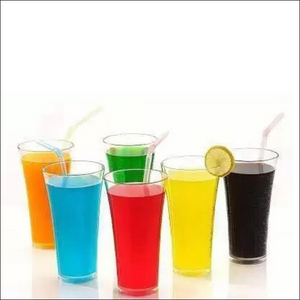 Vibrant transparent juice glass set with colorful drinks and straws for entertaining guests