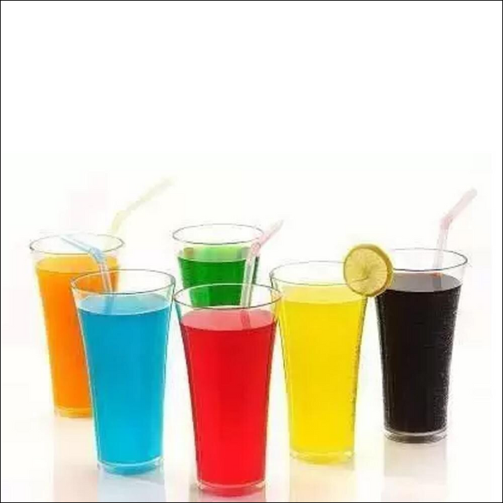 Vibrant transparent juice glass set with colorful drinks and straws for entertaining guests