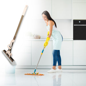 Woman using a super absorbent sponge mop for efficient floor cleaning in a modern kitchen