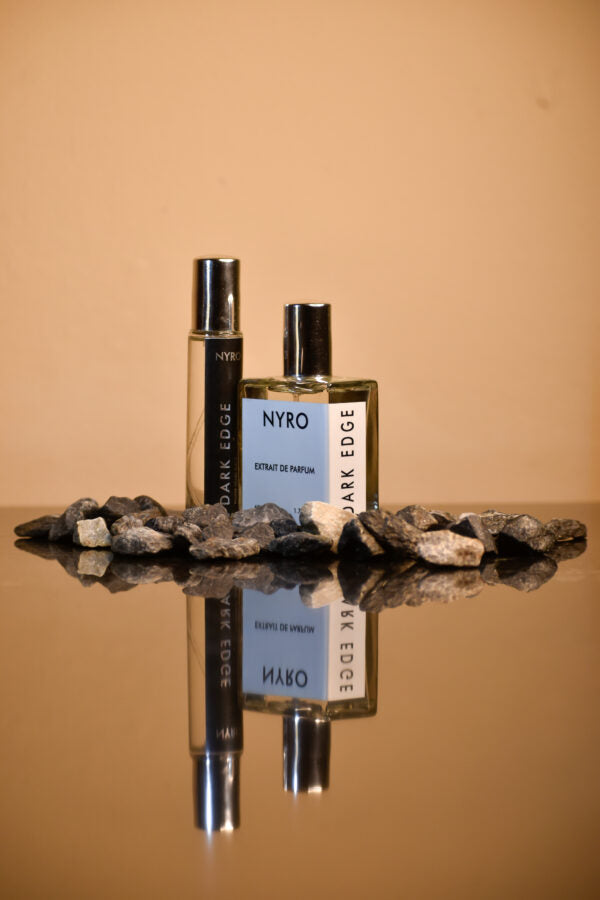 Nyro Dark Force Duo Perfume Set Featuring Two Elegant Bottles on Stone Display