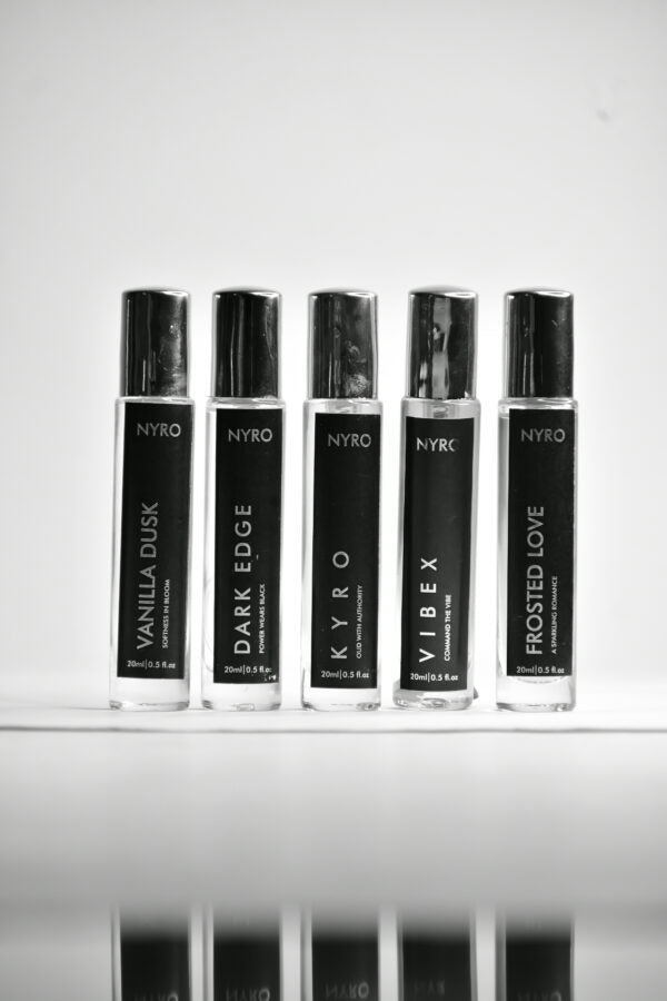 Nyro Essence Collection featuring five perfume rollerballs: Vanilla Dusk, Dark Edge, Kyro, Vibex, and Frosted Love