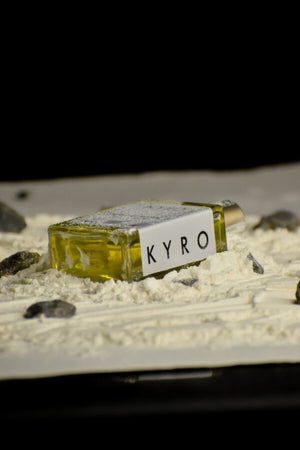 Nyro Kyro Perfume Bottle with Unique Design Set Against a Textured Background