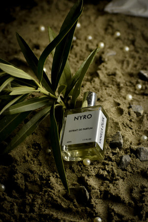 Nyro Vanilla Rose Extrait de Parfum Bottle with Elegant Design in Natural Setting