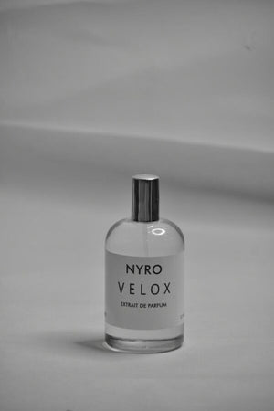 Nyro Velox Extrait de Parfum in a clear glass bottle for a luxurious scent experience