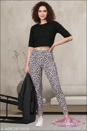 Stylish girls in black crop top wearing solid multicolor jeggings for women with leopard print design