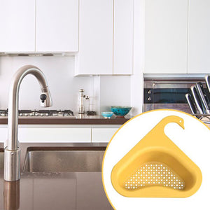 Swan kitchen drain strainer in yellow placed in a modern kitchen sink for effective food waste filtration