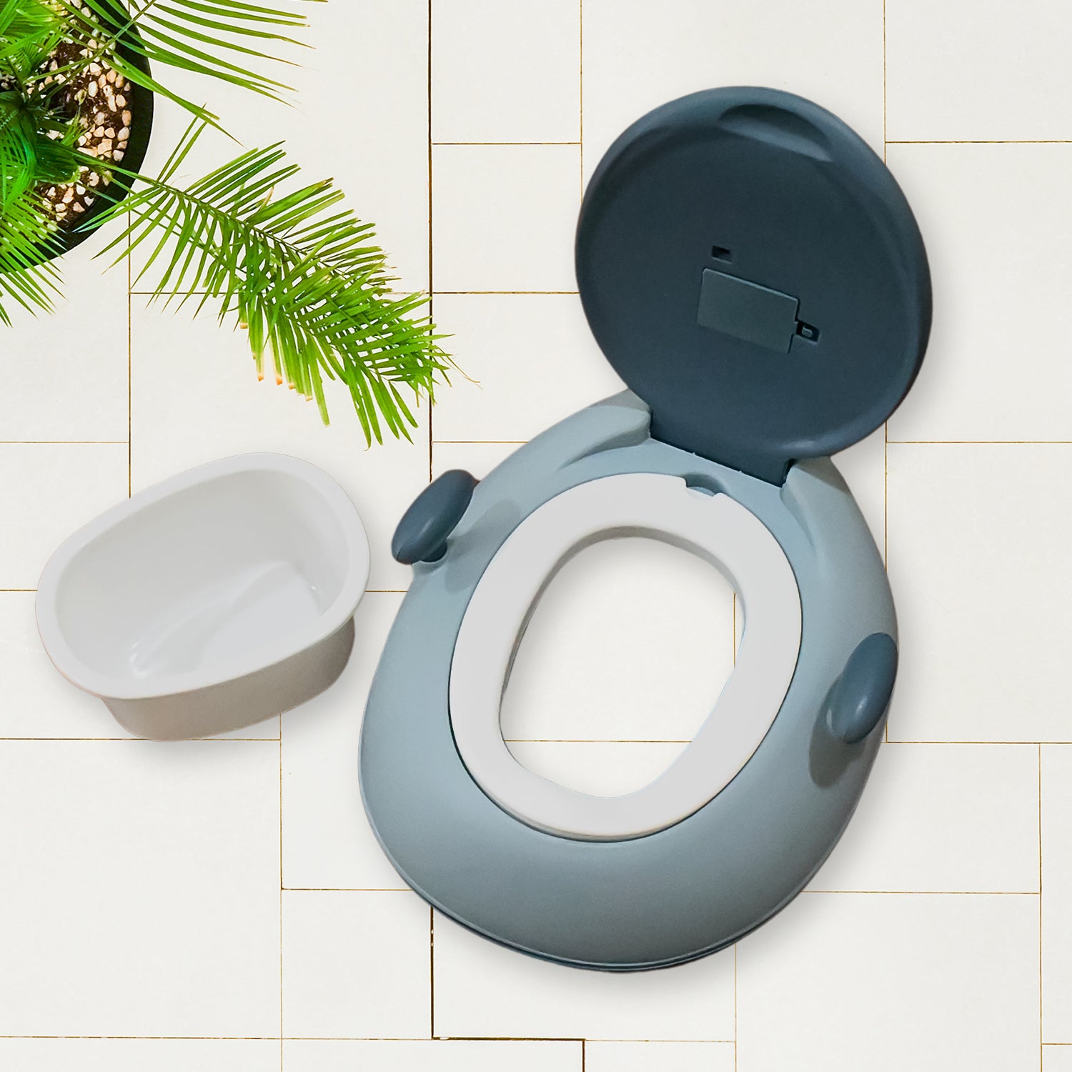 Toddler potty chair with lighting featuring a removable bowl for easy cleaning and a friendly design