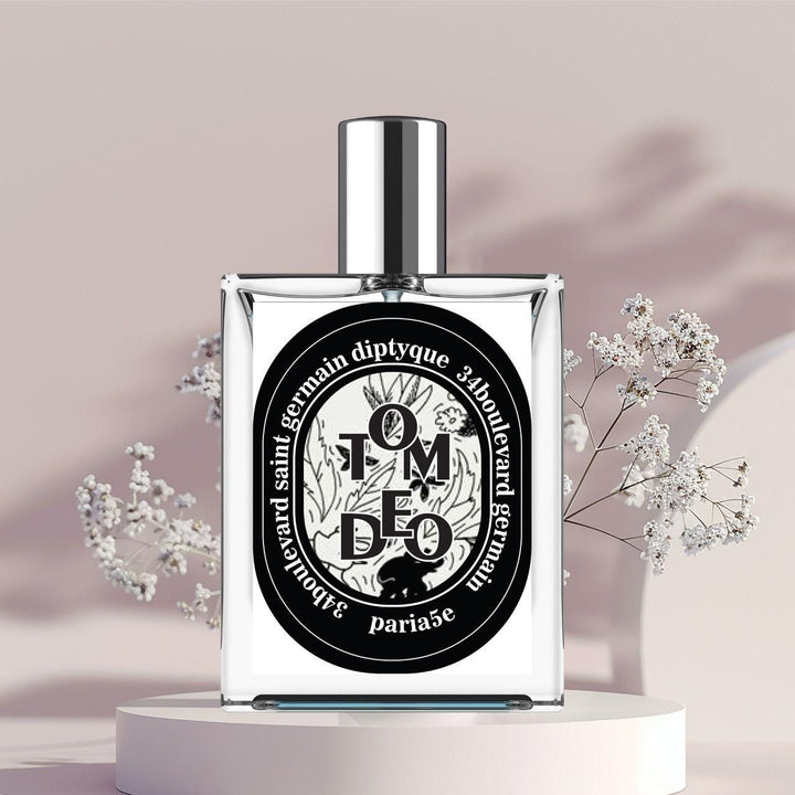 34 Boulevard Germain perfume by Superior eMart in clear glass bottle with black and white label on white pedestal with floral background