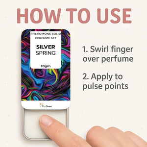 Solid fragrance pack of 2 Silver Spring pheromone solid perfumes with colorful swirl design and usage instructions