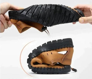 Mens Stylish Casual Shoes tan flexible shoe folded to show black rugged sole and breathable side cutouts