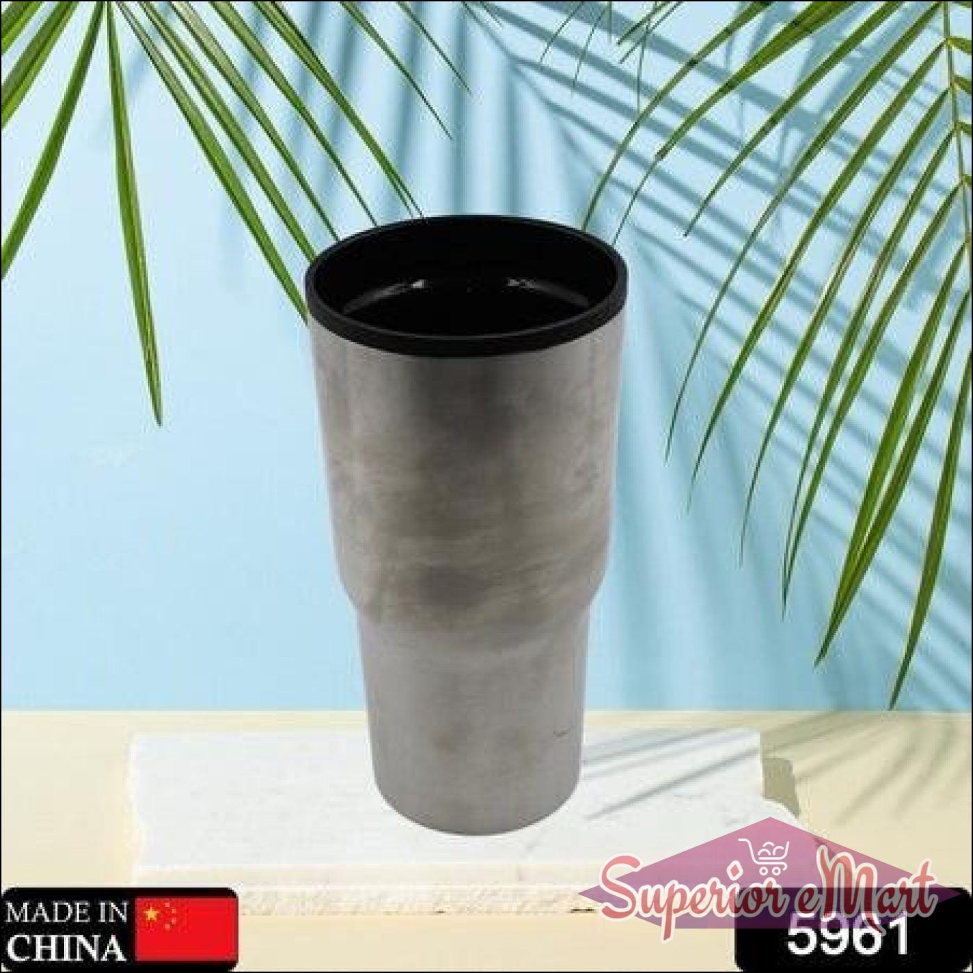 Double walled travel coffee mug in stainless steel for keeping beverages hot or cold on the go