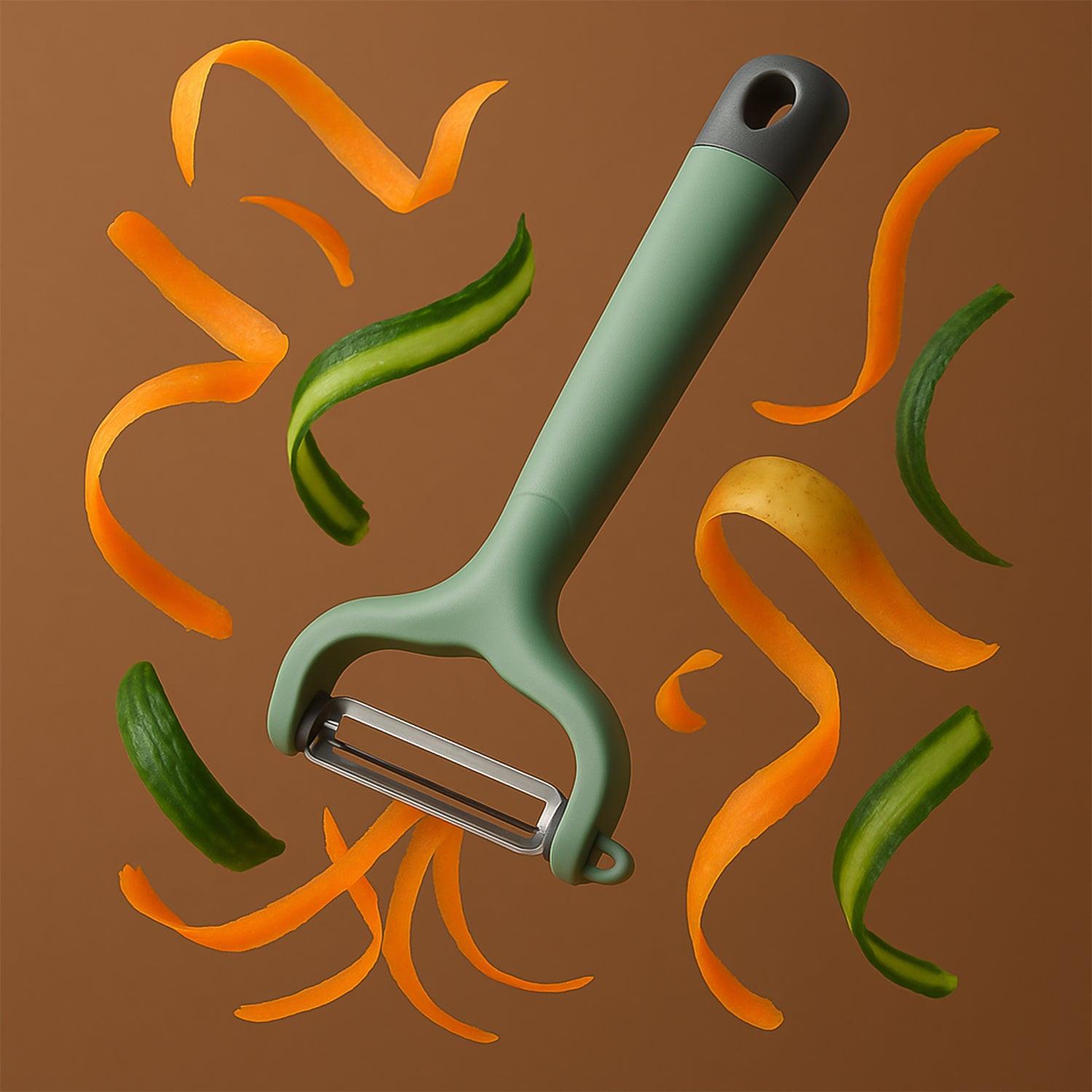 Superior eMart vegetable fruit peeler with ergonomic handle surrounded by colorful vegetable peels