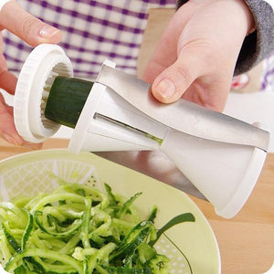 Superior eMart vegetable spiralizer slicer in use, creating spiralized cucumber noodles in a bowl