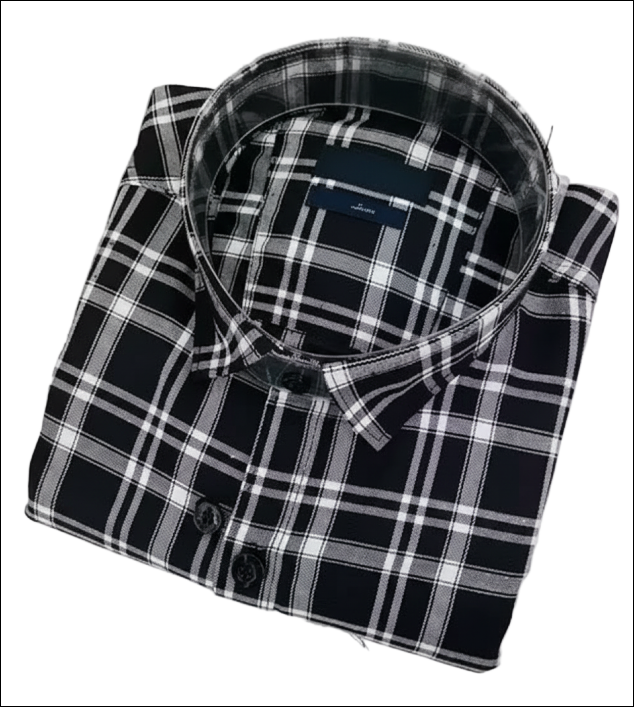 Folded black and white plaid shirt on a white background