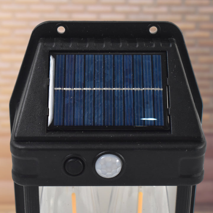 Close-up of 18w solar wall lights featuring a solar panel and motion sensor for outdoor use