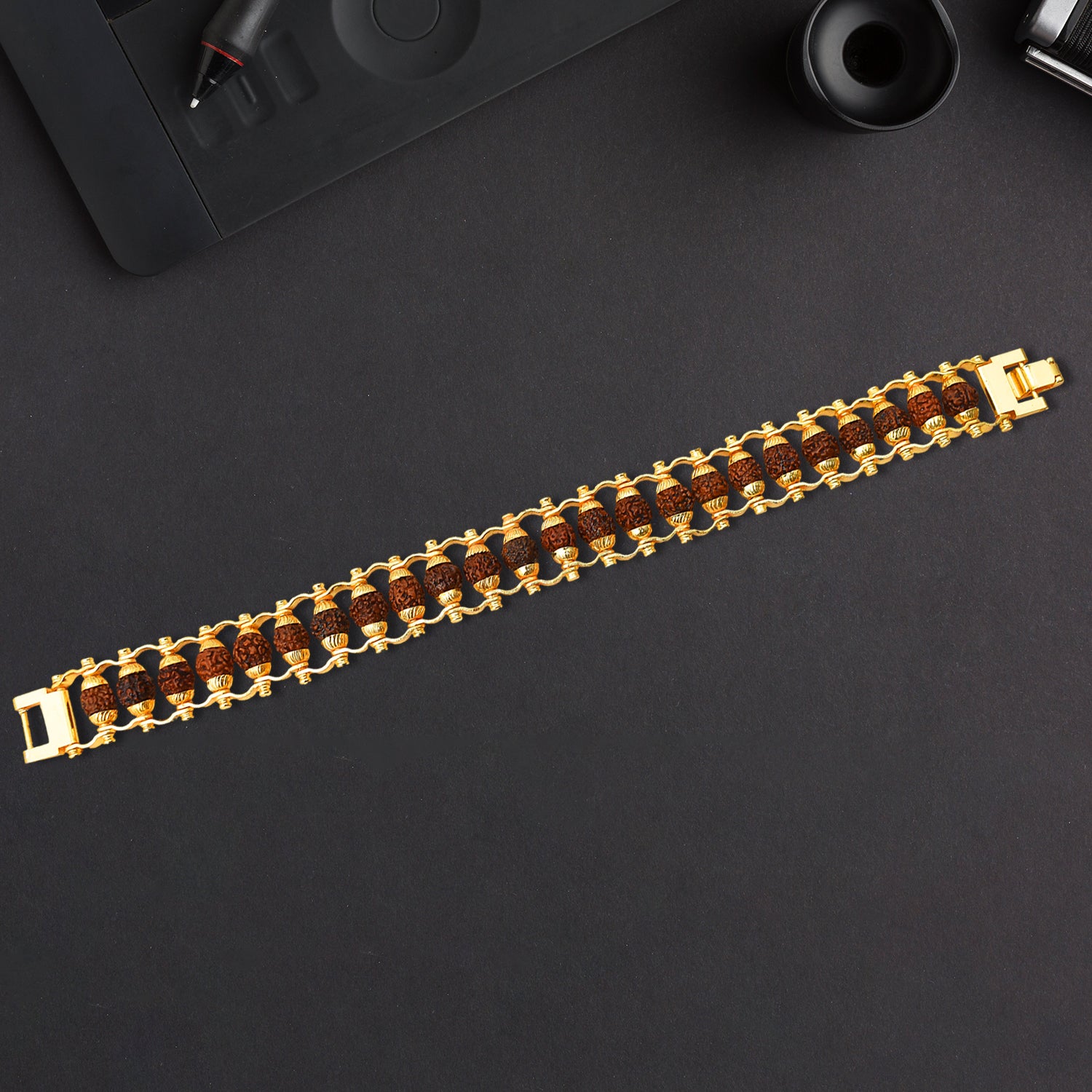 Golden Rudraksha Bracelet Rakhi with intricate design, perfect for festive occasions and gifting