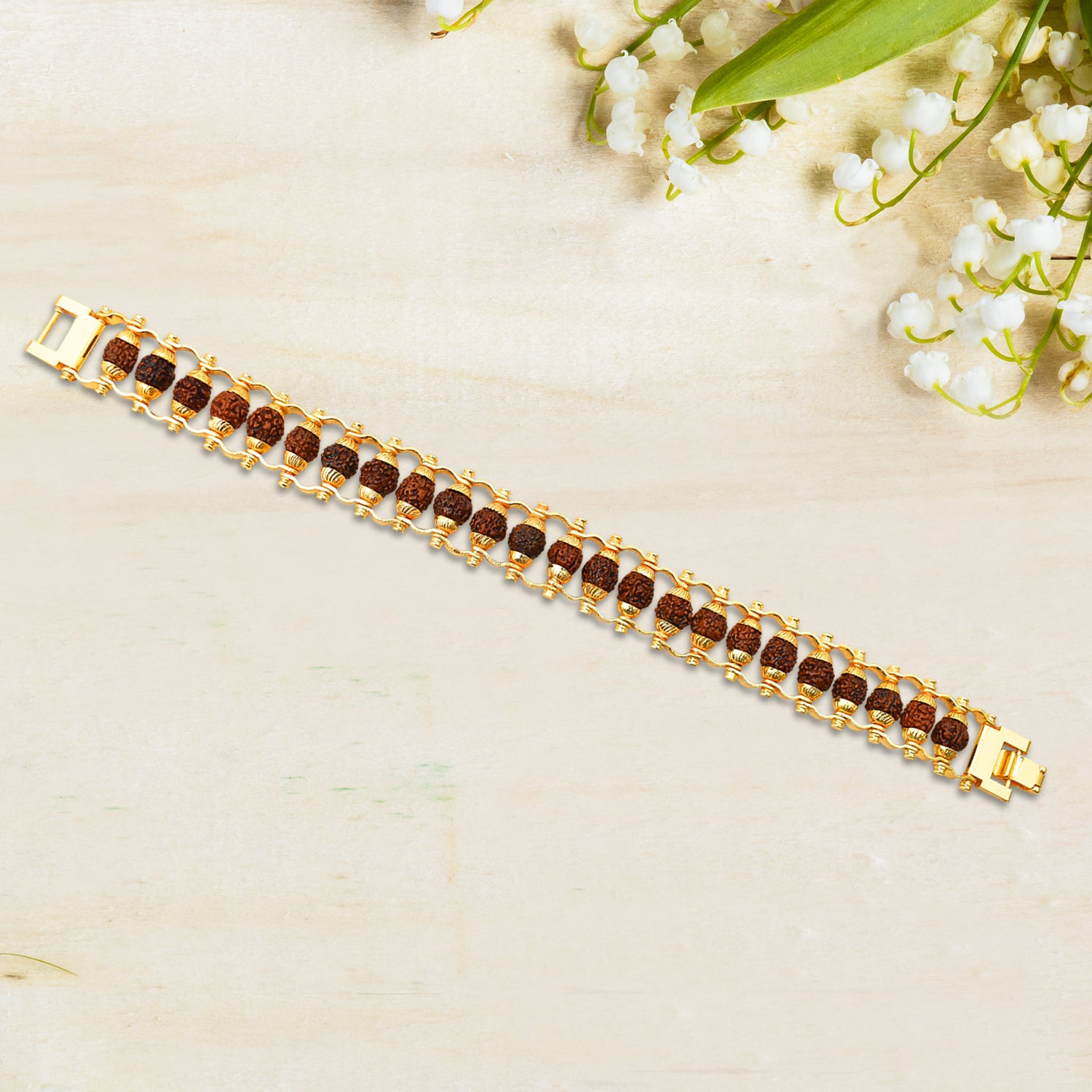 Elegant Golden Rudraksha Bracelet Rakhi with a unique design and polished finish
