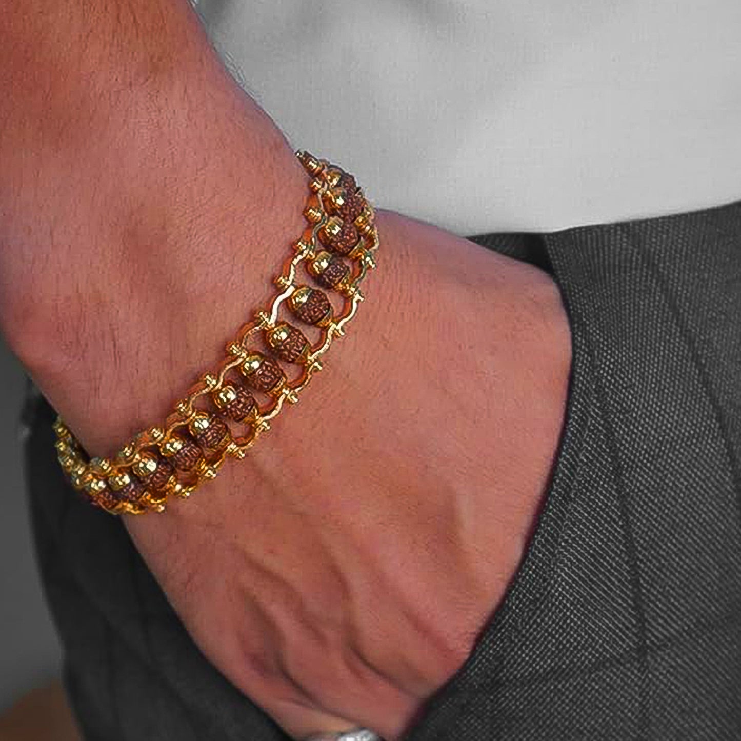 Elegant Golden Rudraksha Bracelet Rakhi with intricate design and premium finish for special occasions
