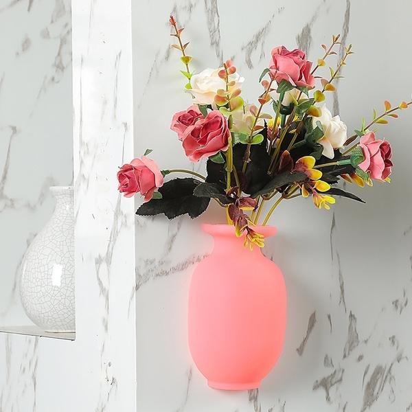 Decorative pink wall mounted flower pot sticker with vibrant faux flowers for modern home decor