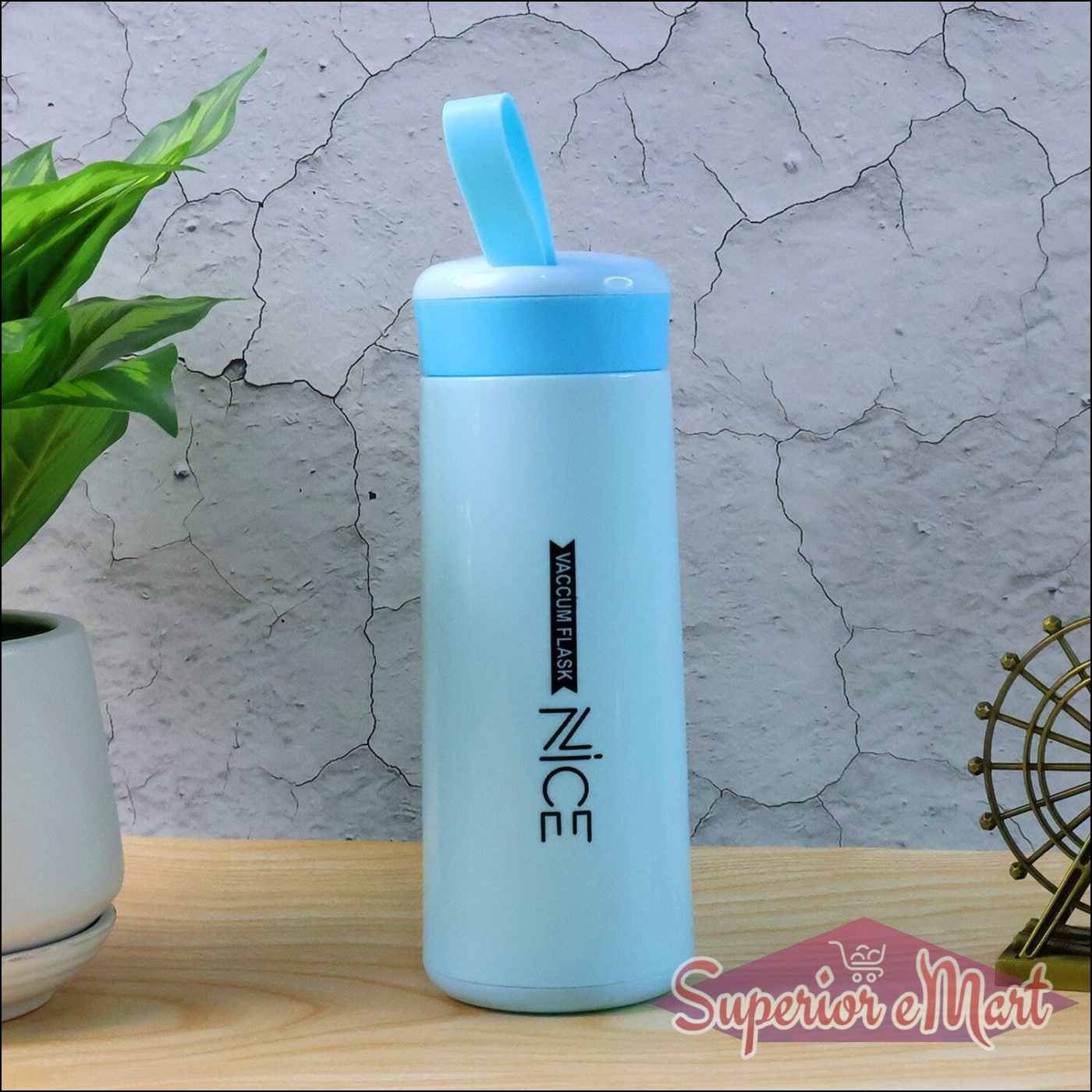 Superior eMart leak proof glass water bottle with a blue lid perfect for everyday hydration