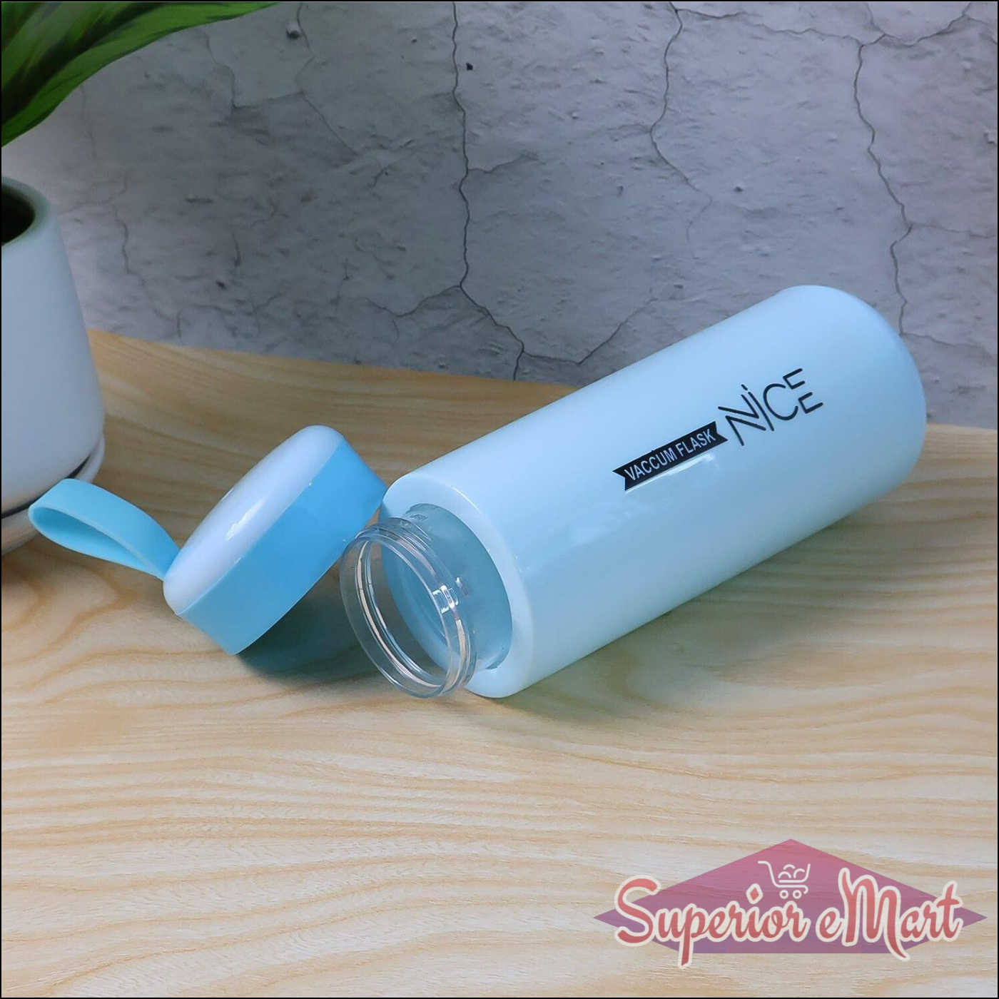 Leak proof glass water bottle with a light blue lid and modern design for everyday hydration