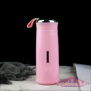 Pink leak proof glass water bottle with a stainless steel lid for safe hydration