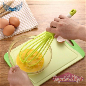 Superior eMart balloon whisk mixer for kitchen in use for mixing eggs in a glass bowl