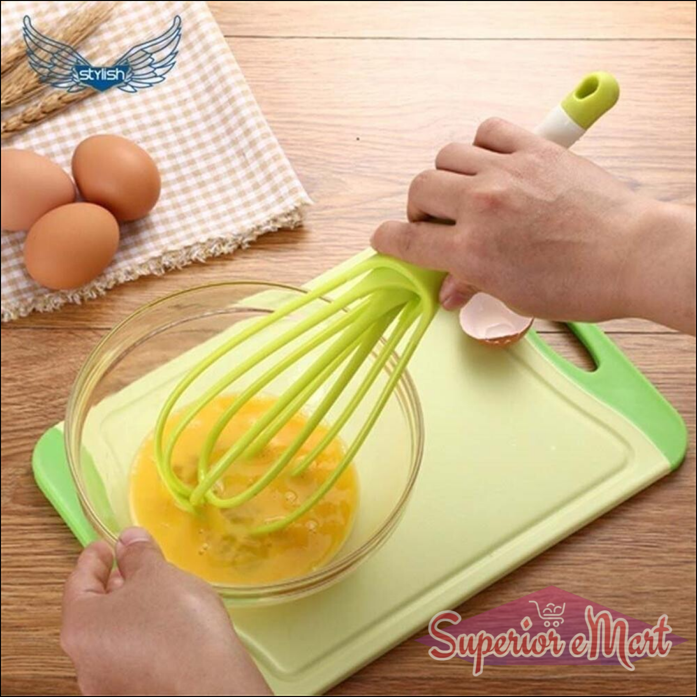 Superior eMart balloon whisk mixer for kitchen in use for mixing eggs in a glass bowl