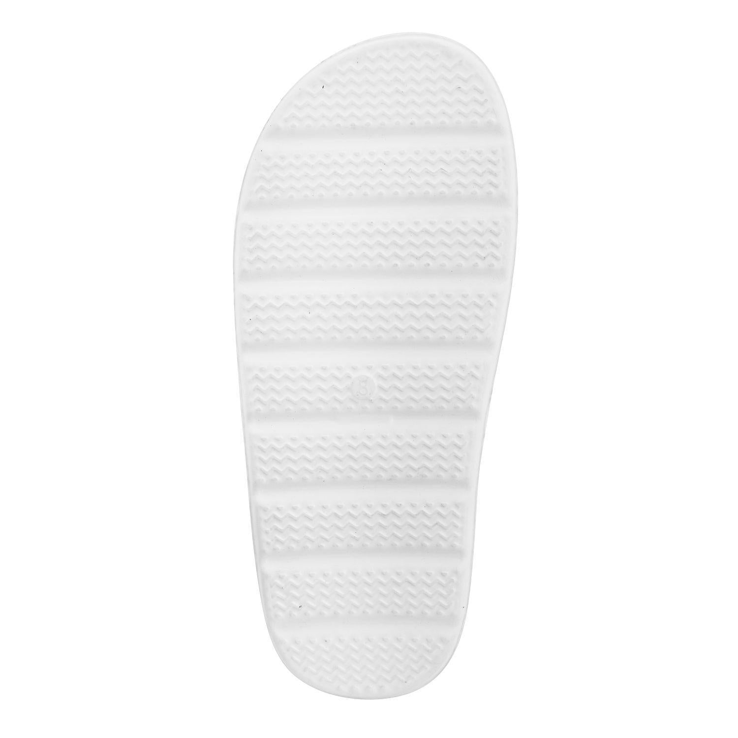 Sole of a White Slider showcasing textured grip for comfort and traction