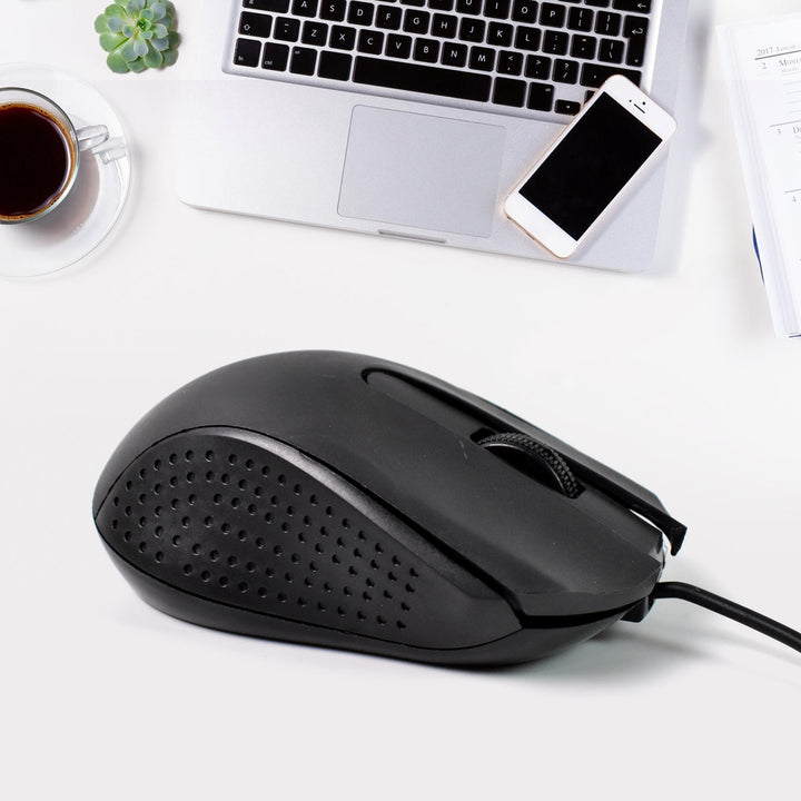 Superior eMart Wired Optical Mouse M-022 in black, positioned beside a laptop and cup of coffee