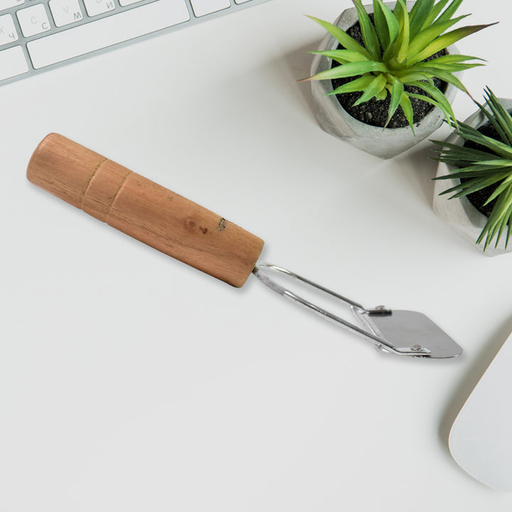 Wooden handle vegetable peeler with stainless steel blade for easy peeling and comfortable grip