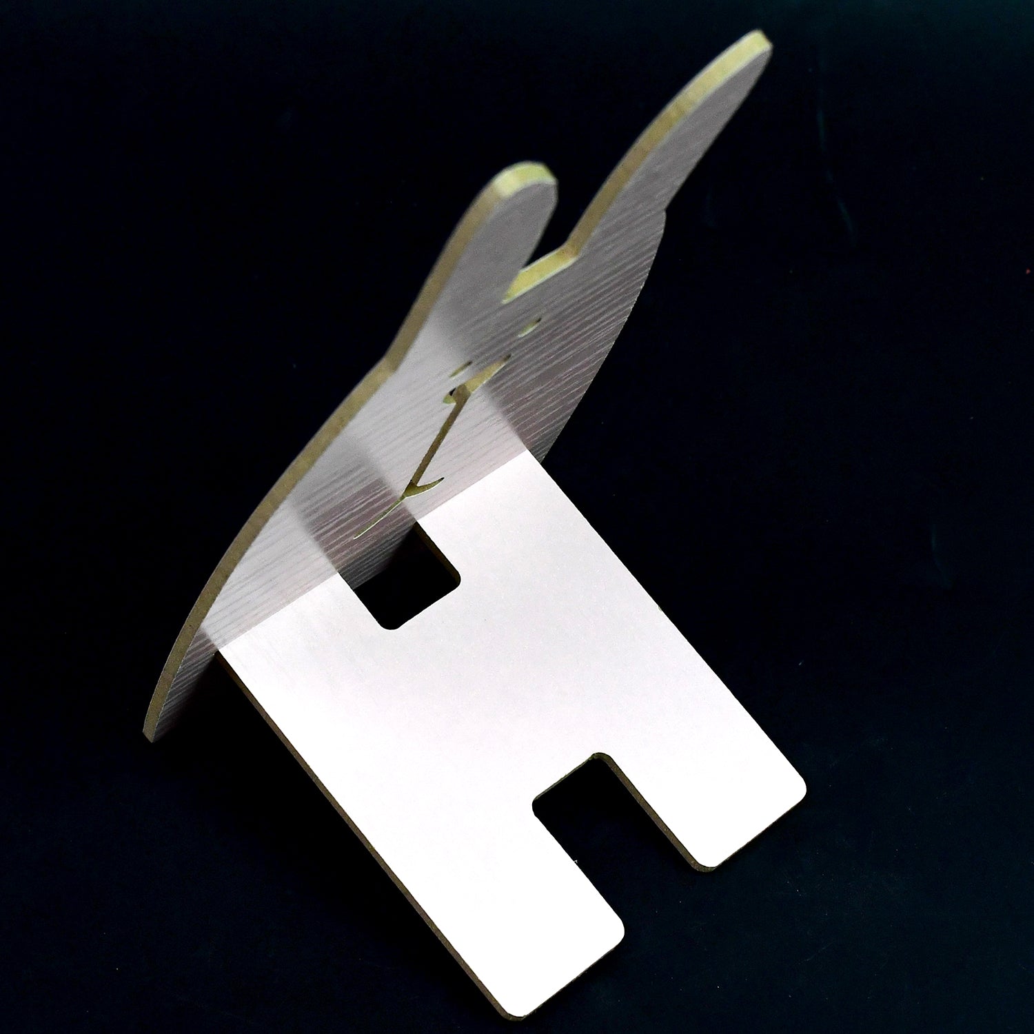 Wooden rabbit phone stand designed for sturdy support and a charming aesthetic in home offices