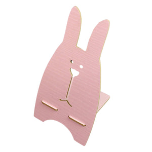 Cute pink wooden rabbit phone stand for holding smartphones securely on desks