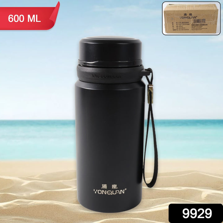 Black stainless steel vacuum bottle 600ml by Superior eMart with carrying strap on beach sand